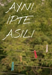 Aynı İpte Asılı